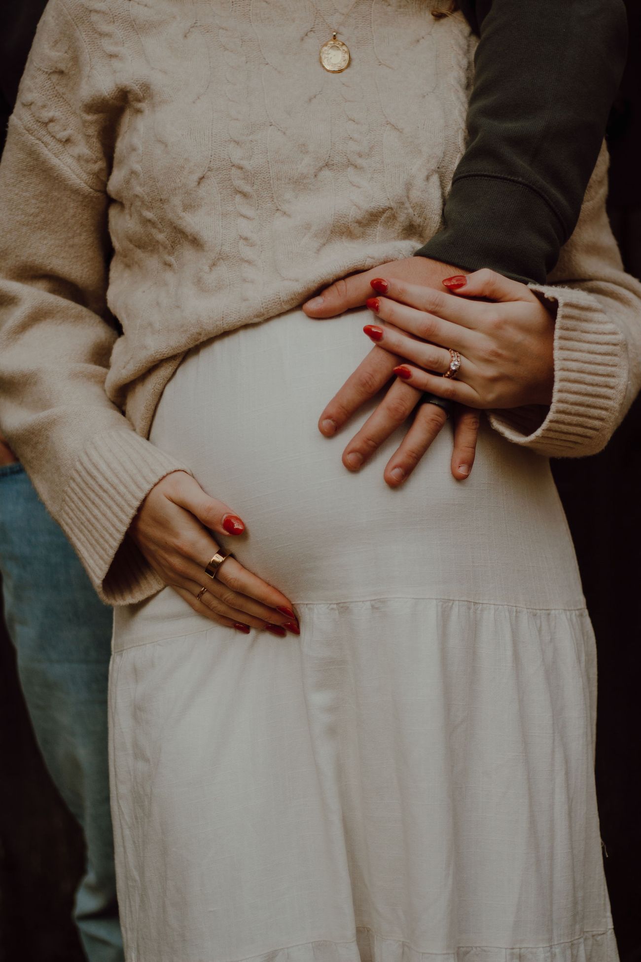 Hands on her belly
