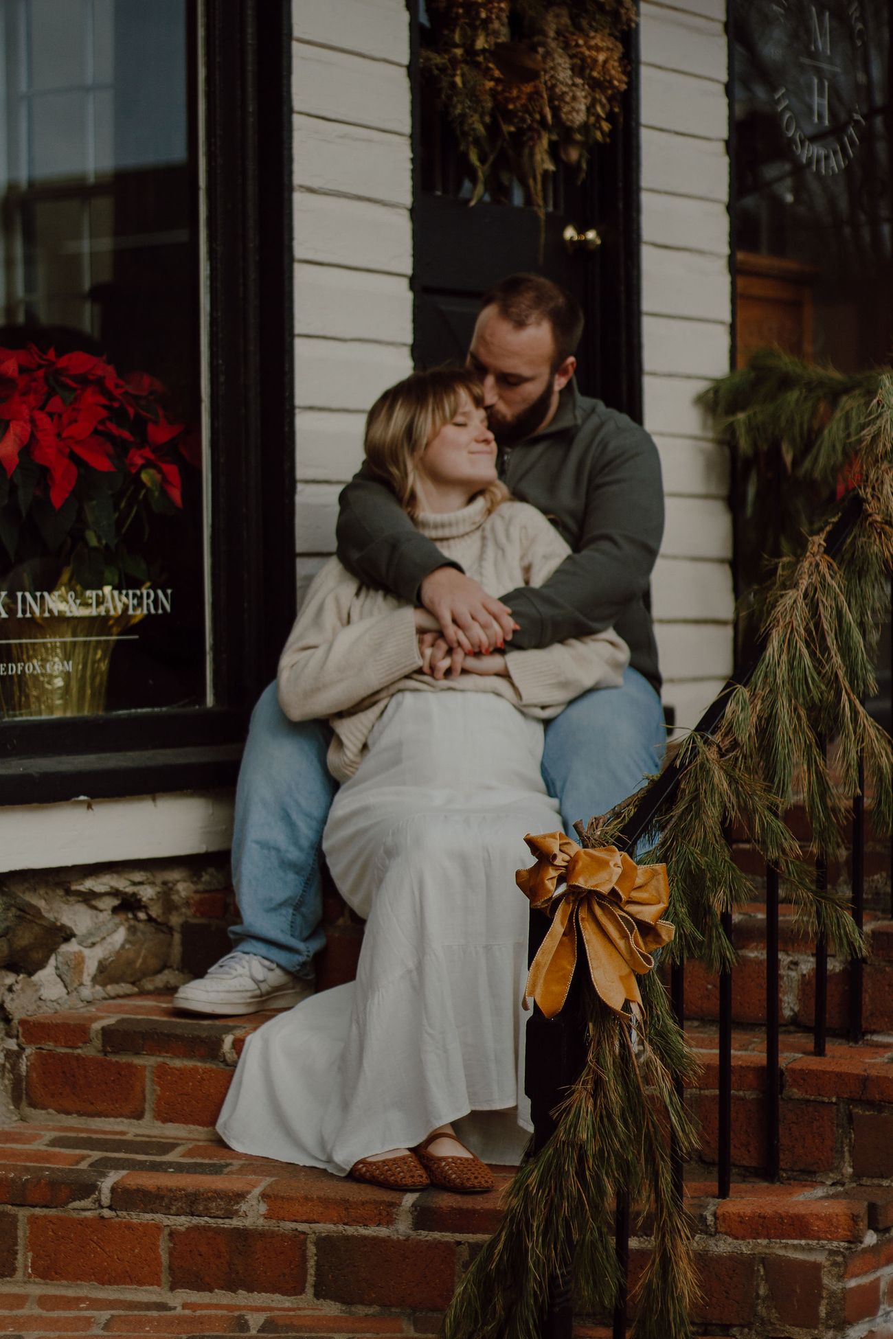 On the steps with the bows