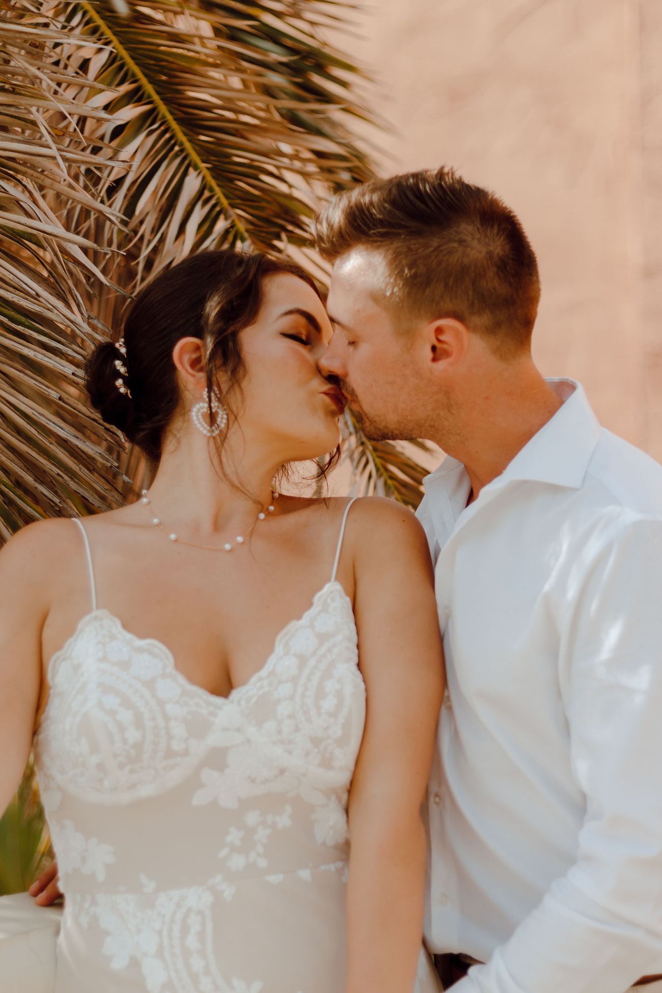 A kiss against the coral wall