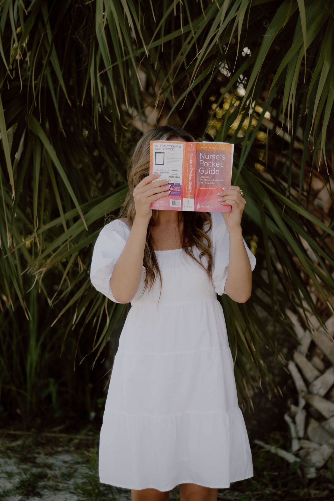 Hiding behind her textbooks