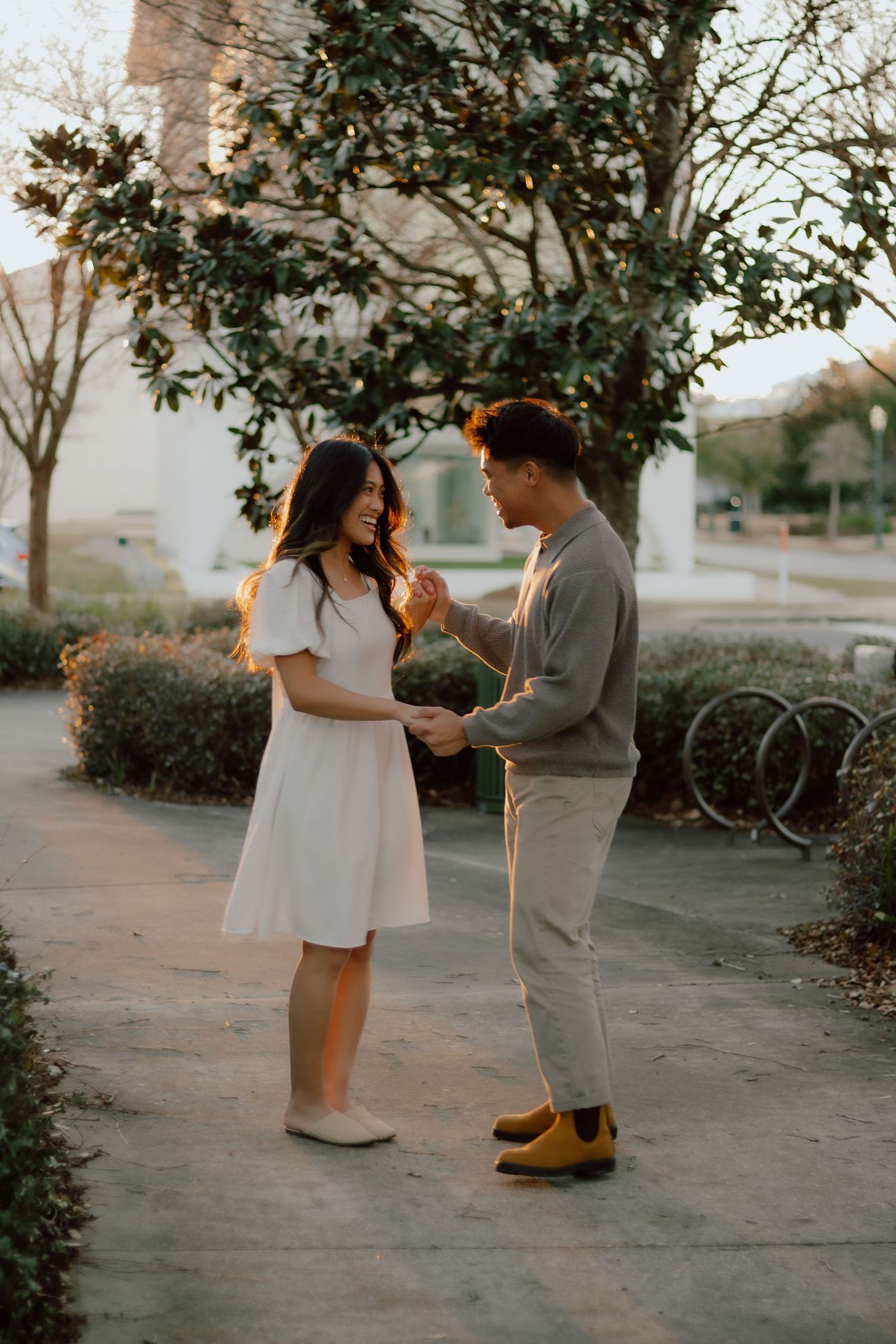 Her hand on his cheek in the sun
