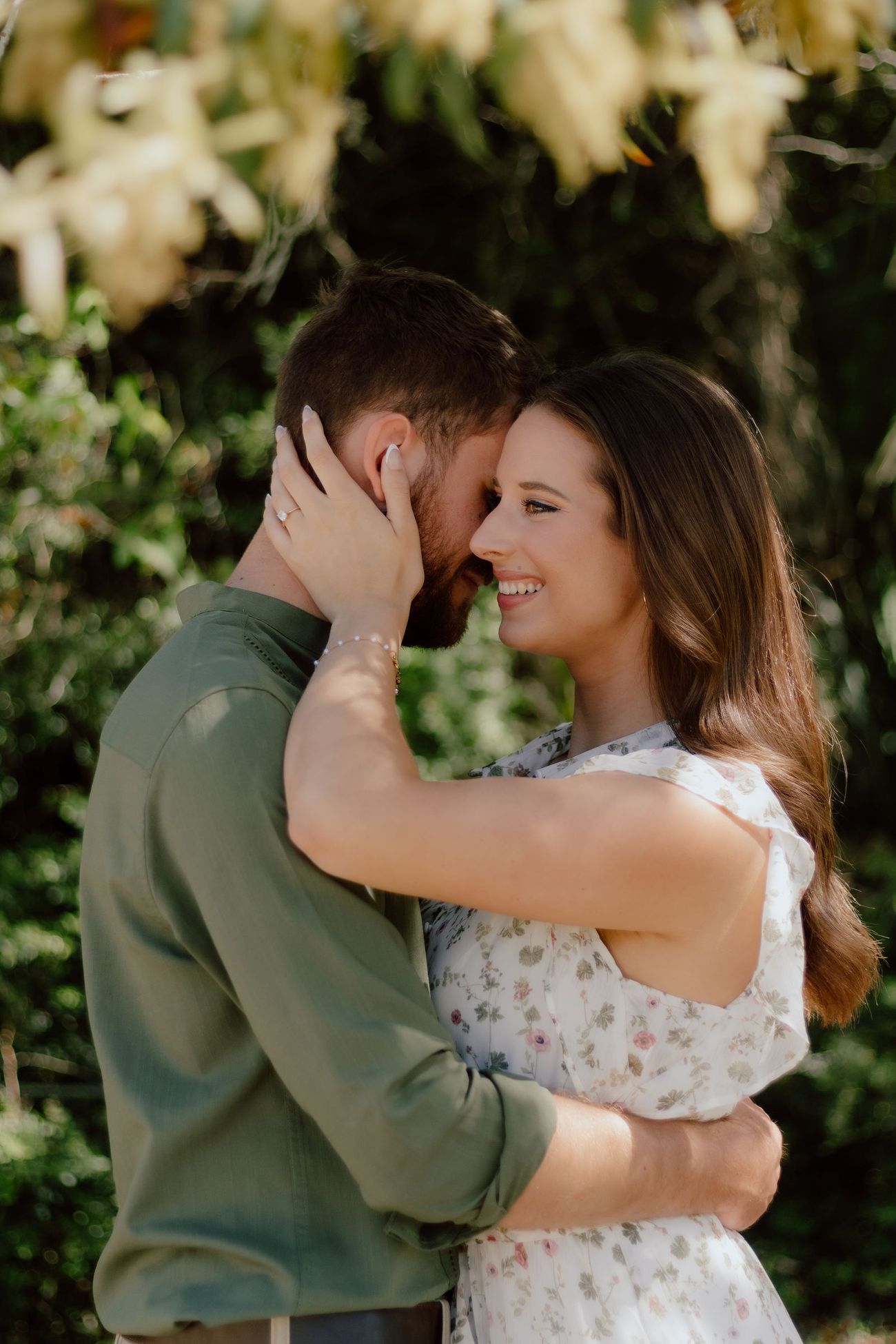 Erin laughing as Micah pulls her in