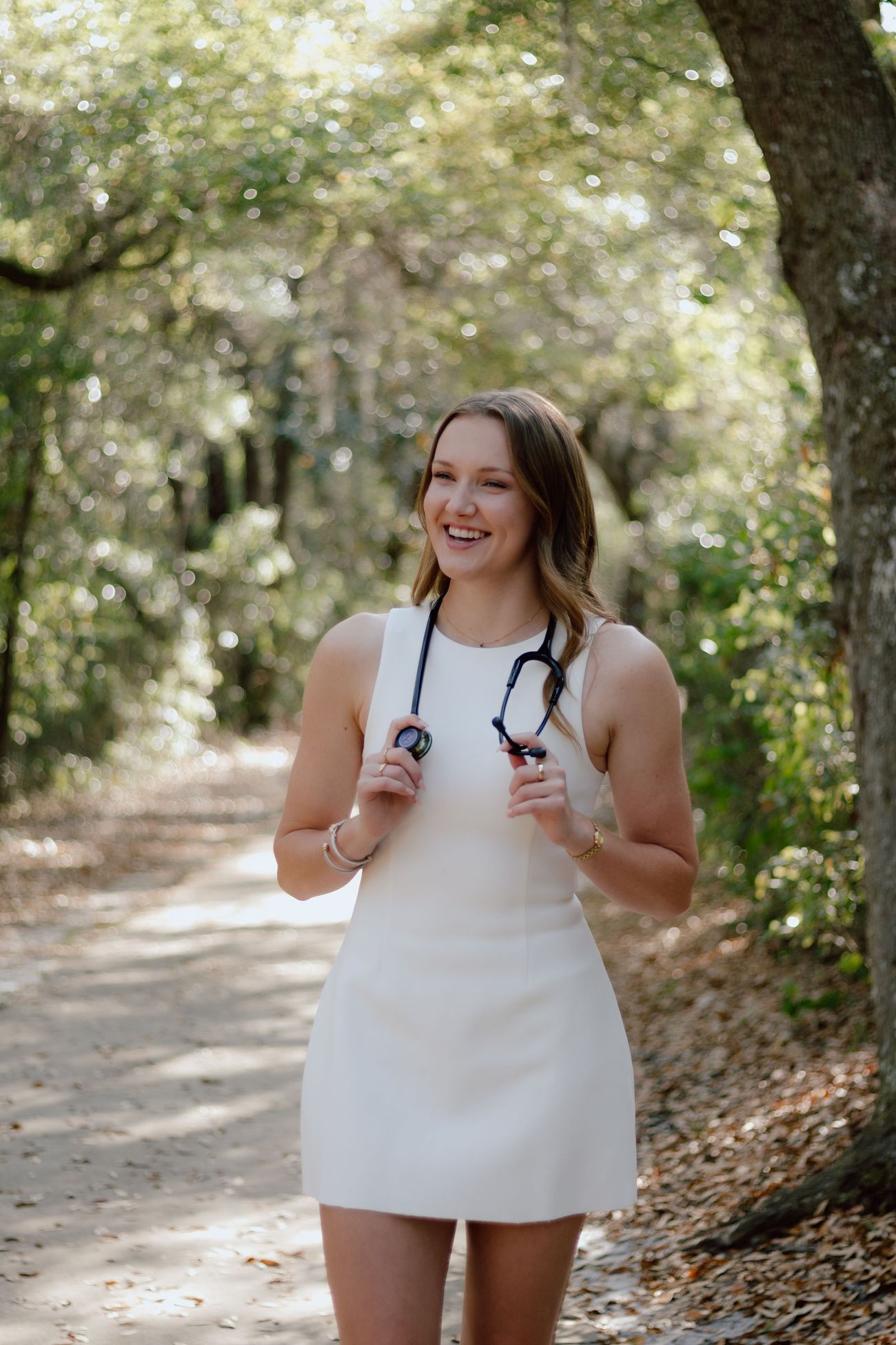 Holding her stethoscope
