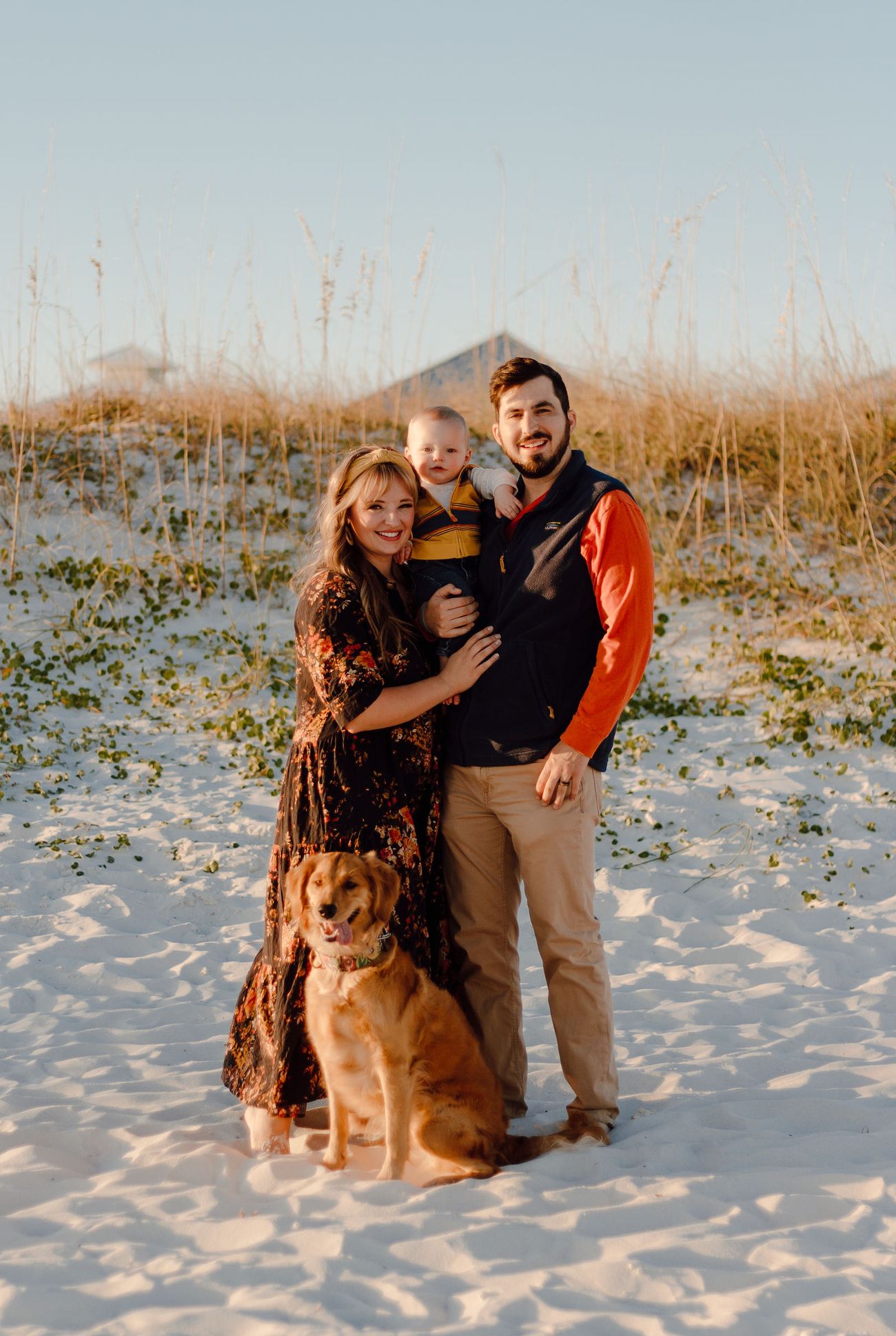 The whole family in the dunes, dog included